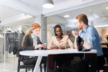 Group of business people sitting at desk