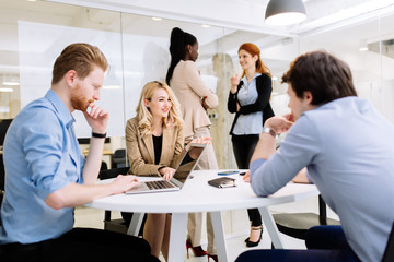 Group of business people working in office