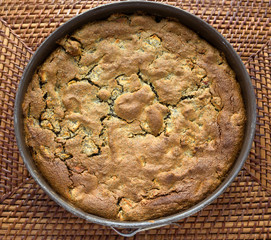 Freshly baked cake in baking pan