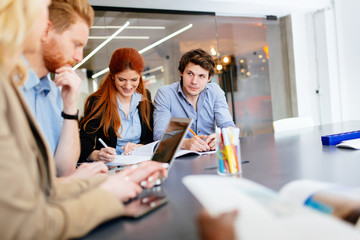 Businesspeople working in office
