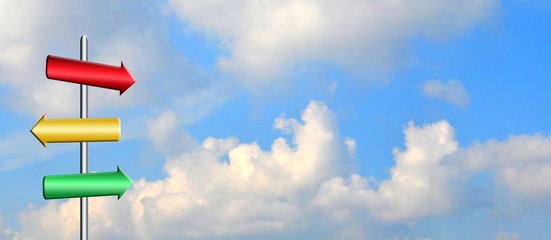 direction signs  against the sky