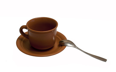 cup and plate / the composition consists a cup and a plate isolated on white background