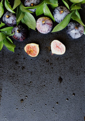 figs with leaves on a black, selective focus