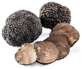Black truffles isolated on a white background.