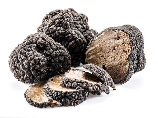 Black truffles isolated on a white background.