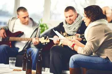 Home band learning new song together