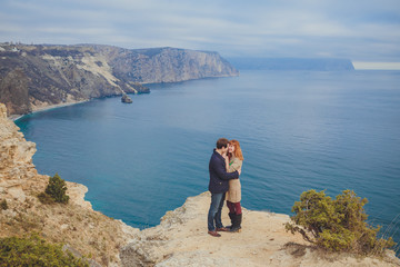 Fototapeta na wymiar couple in love relaxing, mountain Coast Crimea, Ukraine