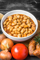 Baked beans with sausage in tomato sauce