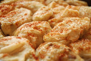 Sarma Specialty sprinkled with red pepper. Close-up
