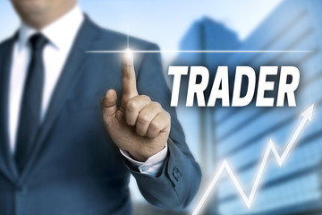 trader touchscreen is operated by businessman