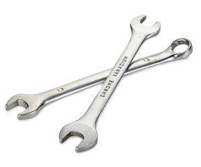 Two metal wrenches close-up isolated on a white background.
