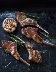 Grilled fresh lamb ribs with rosemary and garlic