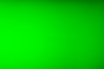 Green glass light elements close-up as background.