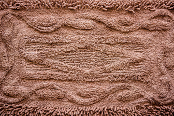Brown cleaning doormat or carpet texture