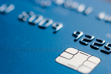 Blue credit card chip blurred atm emv