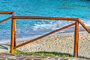 wooden fence by the shore