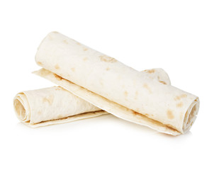 Wheat round tortillas close-up isolated on a white background. Lavash.