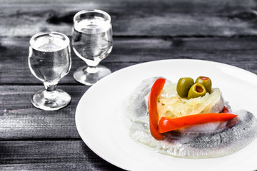 Marinated herring and vodka shot