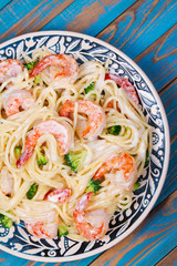 Creamy Shrimp and broccoli Spaghetti. View from above, top studio shot