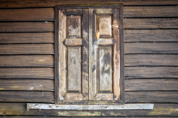 .Wooden window and textured vintage wood wall