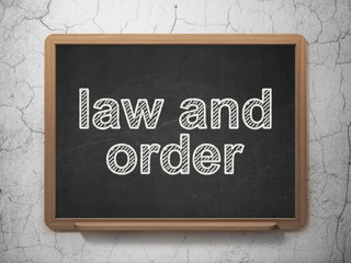 Law concept: Law And Order on chalkboard background