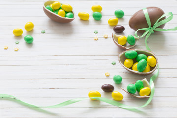 Chocolate Easter Eggs Over Wooden Background