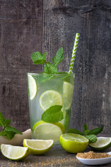 Fresh mojito on a rustic wood table
