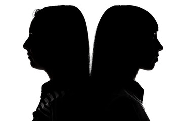 Women standing back-to-back 