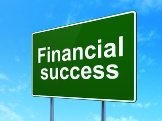 Money concept: Financial Success on road sign background