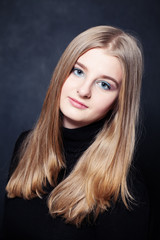 Naklejka premium Portrait of Teenager Girl with Long Blonde Hair. Young Beauty
