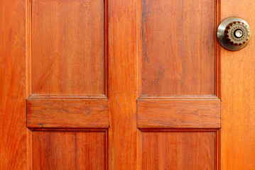 metal handle on a old wooden door