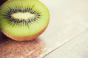 close up of ripe kiwi slice on table