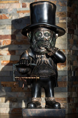 Fototapeta premium Elegant monkey toilet paper holder. Bathroom interior.