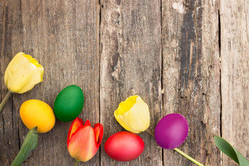 Colorful Easter eggs with tulips