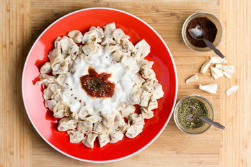 Turkish dumplings with yogurt dressing