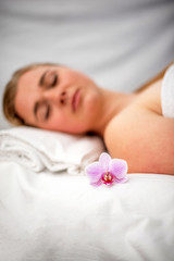 Obraz na płótnie Canvas Woman lying on massage table prepaired for beauty treatment.