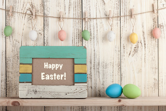 Easter eggs with holiday greeting