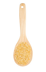 Isolated a scoop of yellow bean seed on a white background