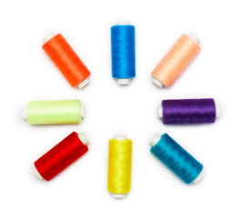 Colorful Sewing Thread Spools Radial Arrangement