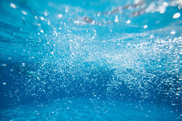  bubbles of water on blue background
