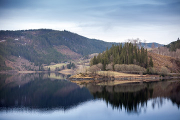 Fototapeta na wymiar Rural spring landscape with mountains, Norway