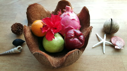 fresh fruits in a coconut bowl