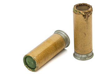 Old and new signal cartridges for flare gun, isolated on white b