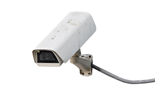 Dirty CCTV camera with wire isolated on white
