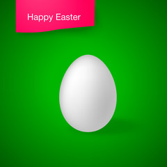 Simple vector Happy Easter card with white realistic egg on the green background and lettering on pink background