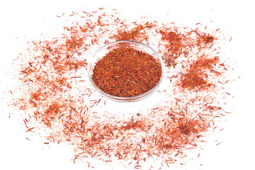 Saffron and bowl on white background