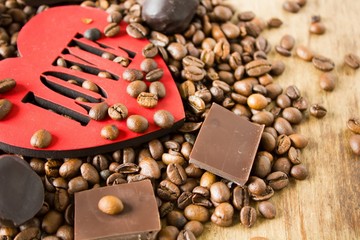 Tiles of dark chocolate and coffee beans 