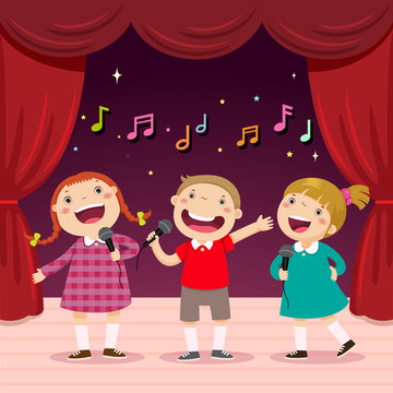 Children sing with a microphone on the stage
