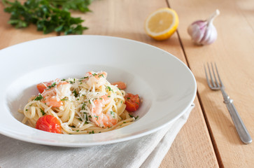 Linguine with shrimps, cherry tomatoes and fresh Parmesan cheese