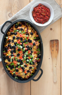 Tortilla Chips Nachos With Melted Cheese, Shredded Chicken, Green Onions, Tomato, Black Olives, Corn And Salsa.